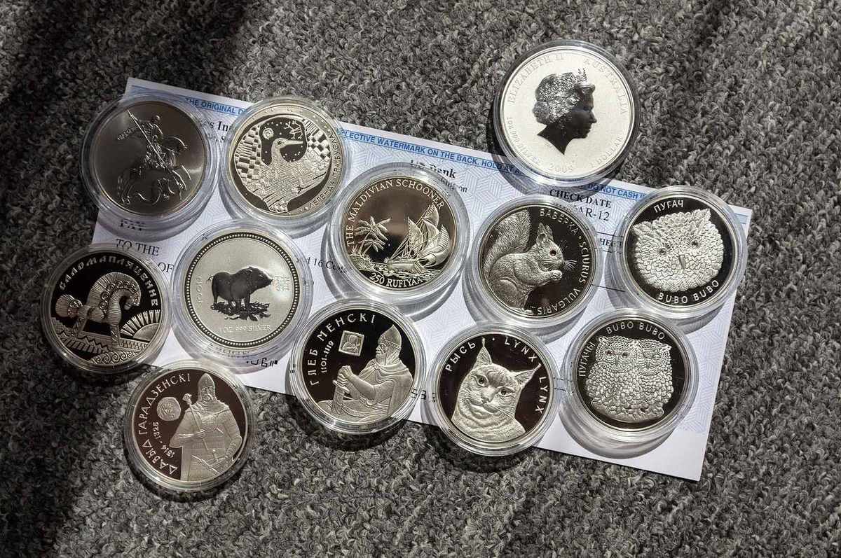 Silver coins spread out for sorting